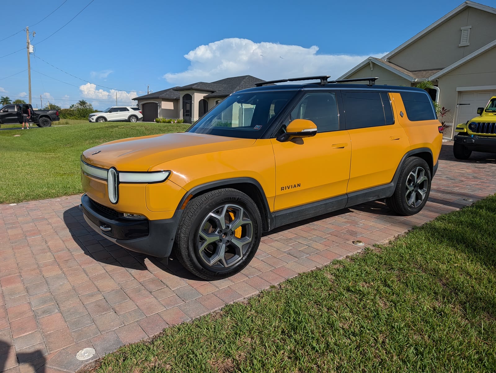 2023 Rivian R1S SUV in yellow